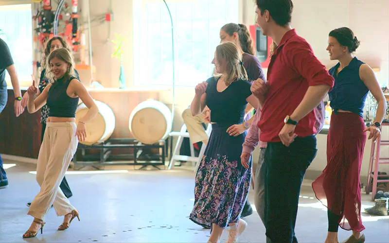 people dancing at salsa social march 2025