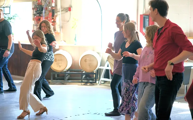 people dancing at salsa social march 2025