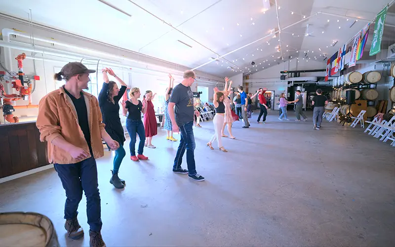 people dancing at salsa social march 2025
