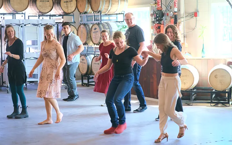 people dancing at salsa social march 2025