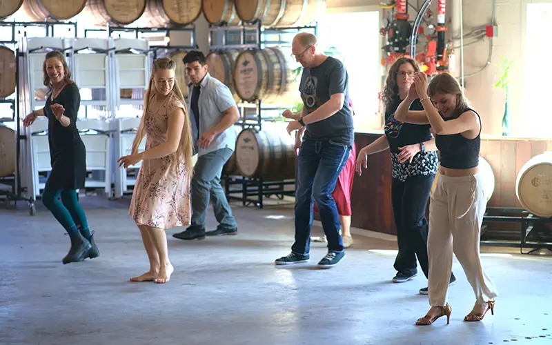 people dancing at salsa social march 2025