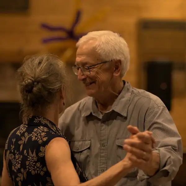 Summer Soirée 2024 older couple dancing and smiling