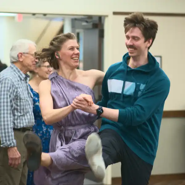 young people energetically dancing the polka